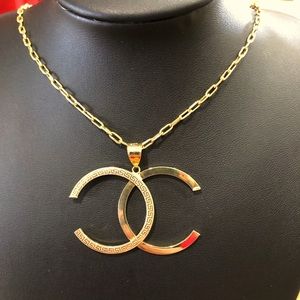 18K Solid Gold (not plated or filled) CC earrings.